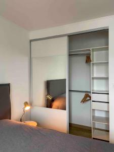 Appartements Appartement avec climatisation proche du centre : photos des chambres