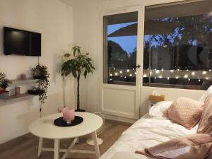 Appartements Studio avec Terrasse - Piscine - WIFI & Parking GRATUIT : photos des chambres