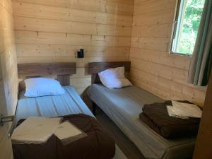 Campings Camping de l'Etang du Pays Blanc : photos des chambres