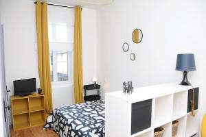 Appartements Grand Appartement Confort : photos des chambres
