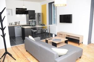Appartements Grand Appartement Confort : photos des chambres