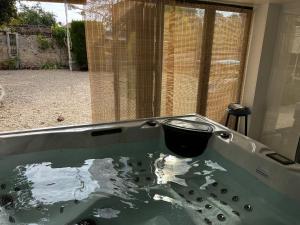 Appartements La petite Brainoise - Gite avec salle jacuzzi 120 jets : photos des chambres