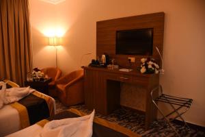 Quadruple Room with Private Bathroom room in Al-Andalus Palace Golden قصر الاندلس الذهبى