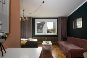 Schickes Boutique-Apartment, zentral in Messe-& Bahnhofsnähe, sehr ruhig & gratis Parkplatz - HappyStay