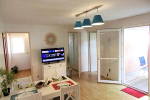 Appartements 36 m with terrace and pool near beach : photos des chambres