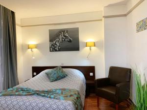 Hotels L'EMBLEME - BOUTIQUE HOTEL : photos des chambres