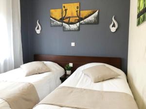 Hotels L'EMBLEME - BOUTIQUE HOTEL : photos des chambres