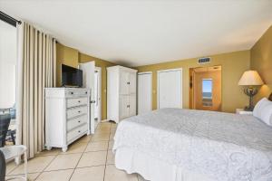 Edgewater Beach Resort #1004 by Book That Condo