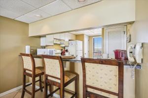 Edgewater Beach Resort #1004 by Book That Condo