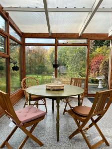 obrázek - House with a magical garden and sunroom