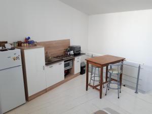 Appartements Appartement en Duplex : photos des chambres