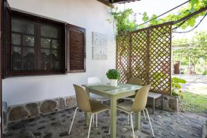 Traditionelles Appartement ATHOS SHADOW 2 am Meer