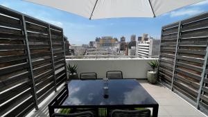 Modern Luxury Studio with Breathtaking City Views - No Load Shedding