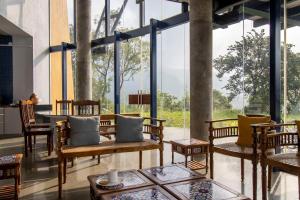 SaffronStays Solasta - 2BR luxury villa with black marble infinity pool, lotus pond & dam views in Mulshi