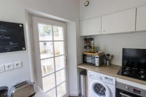 Maisons de vacances Maison au pied du Chateau-Cour-Proche Centre Ville : photos des chambres