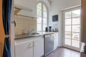 Maisons de vacances Maison au pied du Chateau-Cour-Proche Centre Ville : photos des chambres