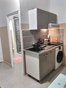 Appartements LE CHARMANT STUDIO 4 FACE GARE *WIFI* : photos des chambres