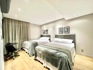 Flat novo, 2 quartos, garagem no coração dos Jardins