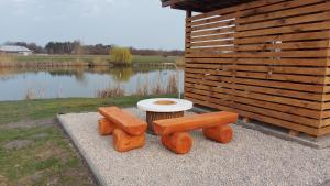 Rybník Biel- Bélyi Horgásztó Drevené chaty - Faházak