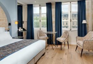Hotels Les Rives de Notre-Dame : photos des chambres