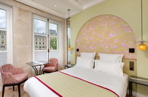 Hotels Les Rives de Notre-Dame : photos des chambres