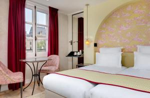 Hotels Les Rives de Notre-Dame : photos des chambres