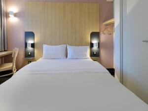 Hotels B&B HOTEL Le Mans Nord 2 : photos des chambres