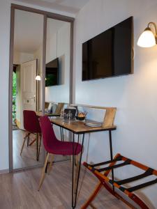 Hotels HOTEL DES DAUPHINS : photos des chambres