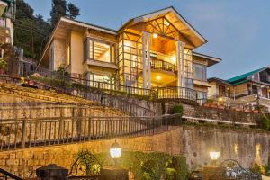 StayVista at Stonehill Manor 3BR Luxury Mountain Cabin with Deck at Dharamshala