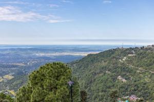 StayVista at Stonehill Manor 3BR Luxury Mountain Cabin with Deck at Dharamshala