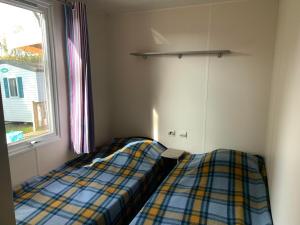 Campings Camping de l'Etang du Pays Blanc : photos des chambres