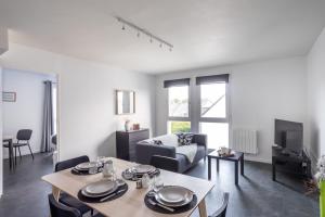 Appartements Coeur Courrouze - Appartement 2 chambres avec parking : photos des chambres