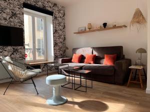 Appartements Un petit air de voyage Coeur de ville : photos des chambres