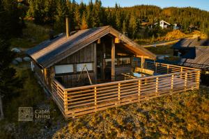 Modern sports cabin on Sjusjøen with sauna and waxing room