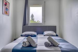 Appartements Le Convertible - Proche Disney - Parking Prive : photos des chambres