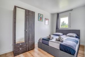 Appartements Le Convertible - Proche Disney - Parking Prive : photos des chambres