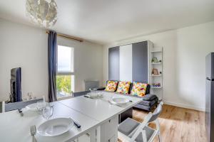 Appartements Le Convertible - Proche Disney - Parking Prive : photos des chambres