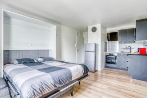 Appartements Le Convertible - Proche Disney - Parking Prive : photos des chambres