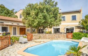 Maisons de vacances Amazing Home In Fleury With Wifi, 6 Bedrooms And Outdoor Swimming Pool : photos des chambres