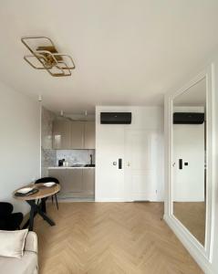 Apartament 204 SUPERIOR Olimpijska nad jeziorem UKIEL, parking w garażu w cenie