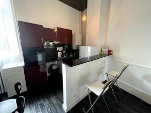 Maisons de vacances Agreable maison de ville dans la plus belle Avenue : photos des chambres