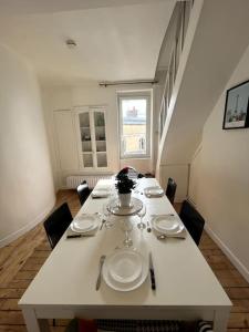 Appartements Menkar YourHostHelper : photos des chambres