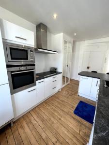 Appartements Menkar YourHostHelper : photos des chambres