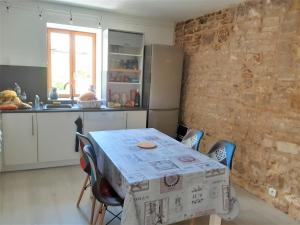 Appartements Nos jours heureux : photos des chambres