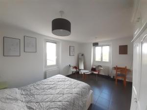 Appartements Nos jours heureux : photos des chambres