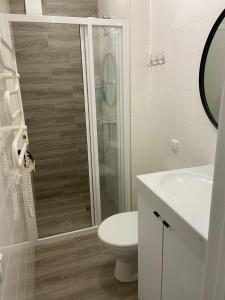 E&K apartamentai su šildomu baseinu kieme