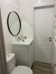 E&K apartamentai su šildomu baseinu kieme