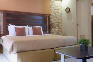 One Palm Tree Villas MANILA