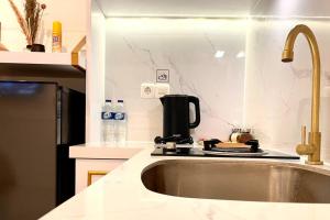 KamaLaaa at Benson Apartment