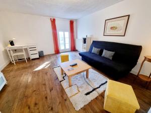 Appartements Grand T2 tout equipe centre ville avec cour : photos des chambres